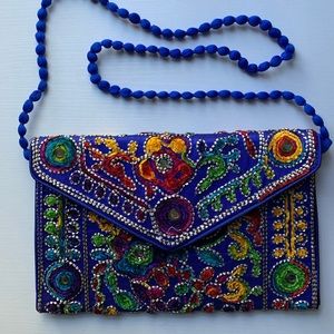 Hand embroidered clutch bag